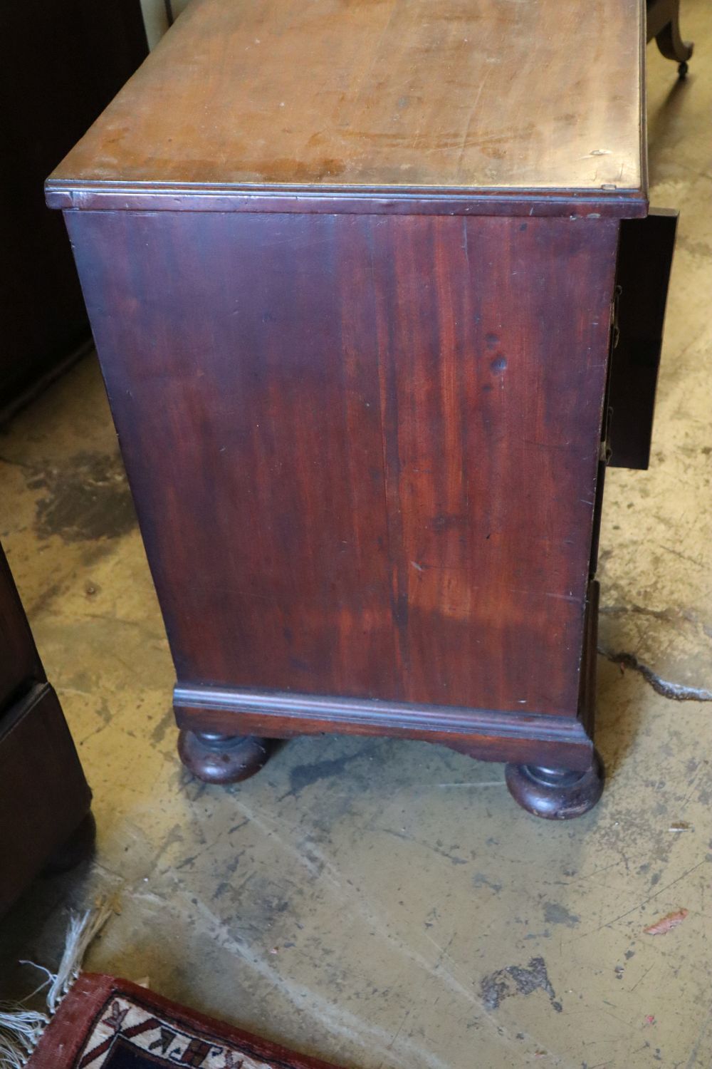 A George II mahogany kneehole desk, width 78cm